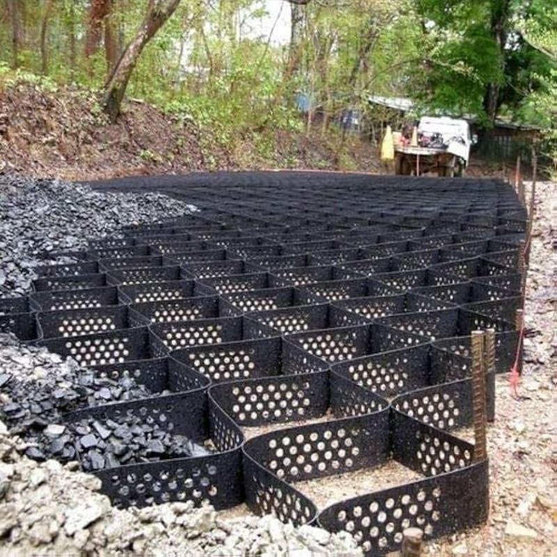 구멍이 있는 질감의 HDPE 지오셀 고세포 구속 시스템 벌집 HDPE 지오셀 도로 기초 사면 보호 주차장 진입로 옹벽